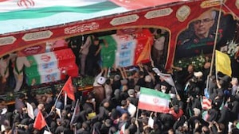 Iran holds state funeral for top brass slain in conflict with Israel