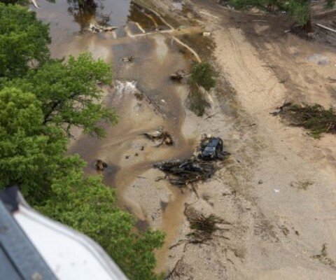 Texas flooding death toll more than 100 as searches continue