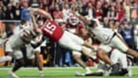 Mendoza’s plunge helps seal first national football title for Indiana after perfect season