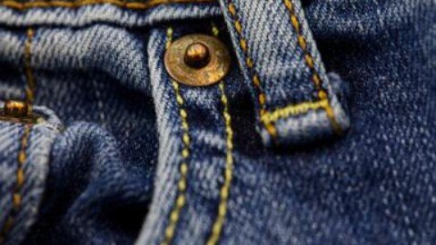 Through much of the American experience, blue jeans have been a common thread