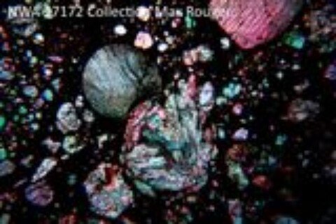 Hectic Mini-Moon Collisions in the Early Solar System Produced the Grains Packed Inside Meteorites