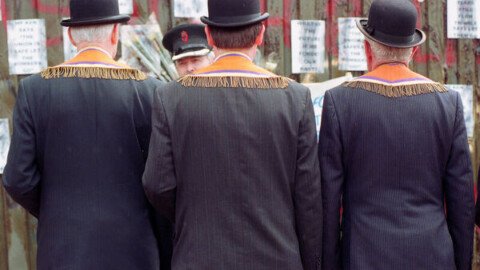 Thousands gather at Garvaghy Road to protest Orange Order parade